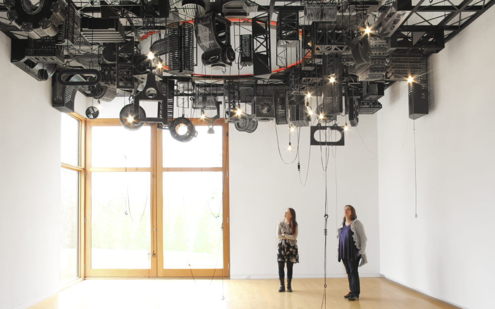 Audio equipment hangs from the ceiling
