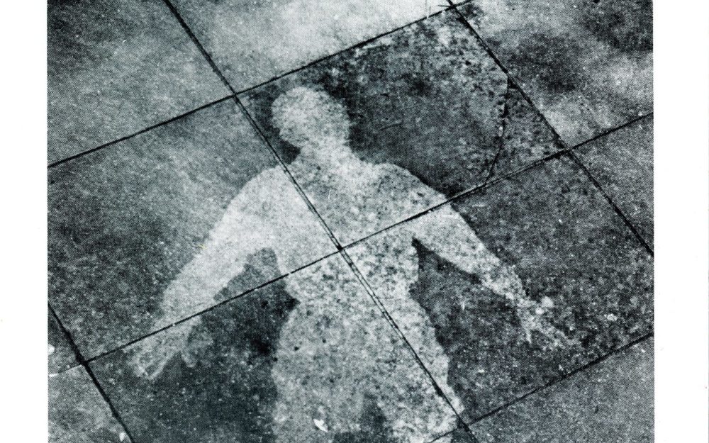 Silhouette of a body on the ground