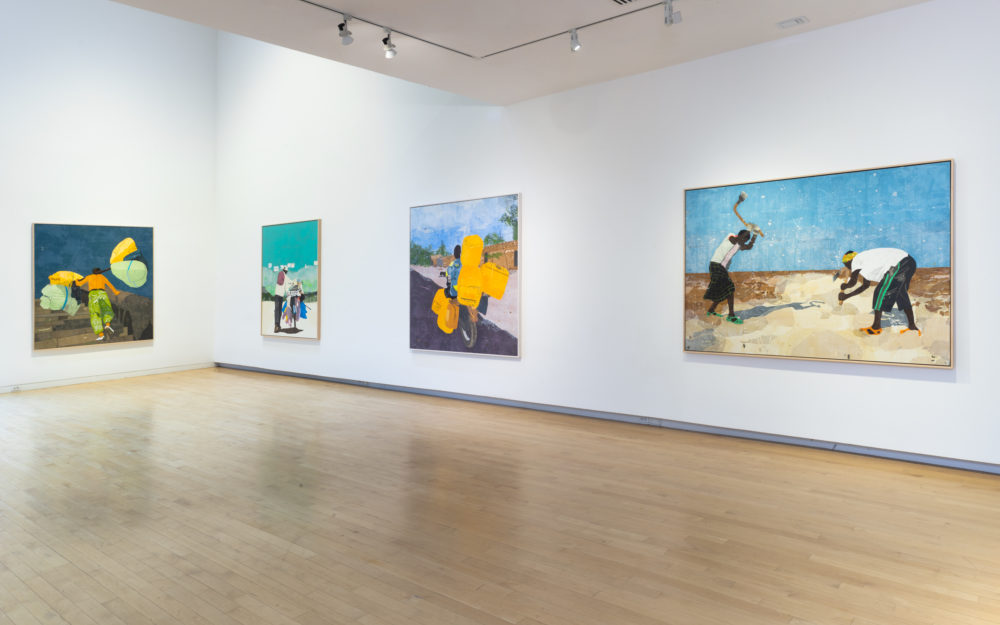 Four large canvas works on white gallery walls