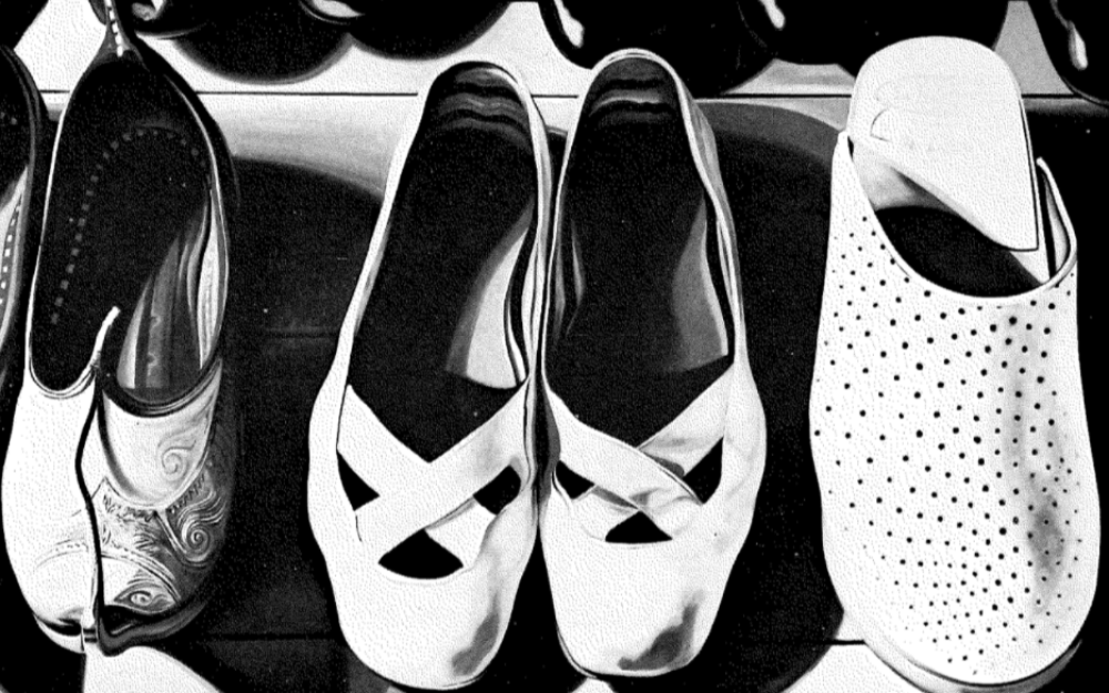 Three pairs of shoes, black and white print