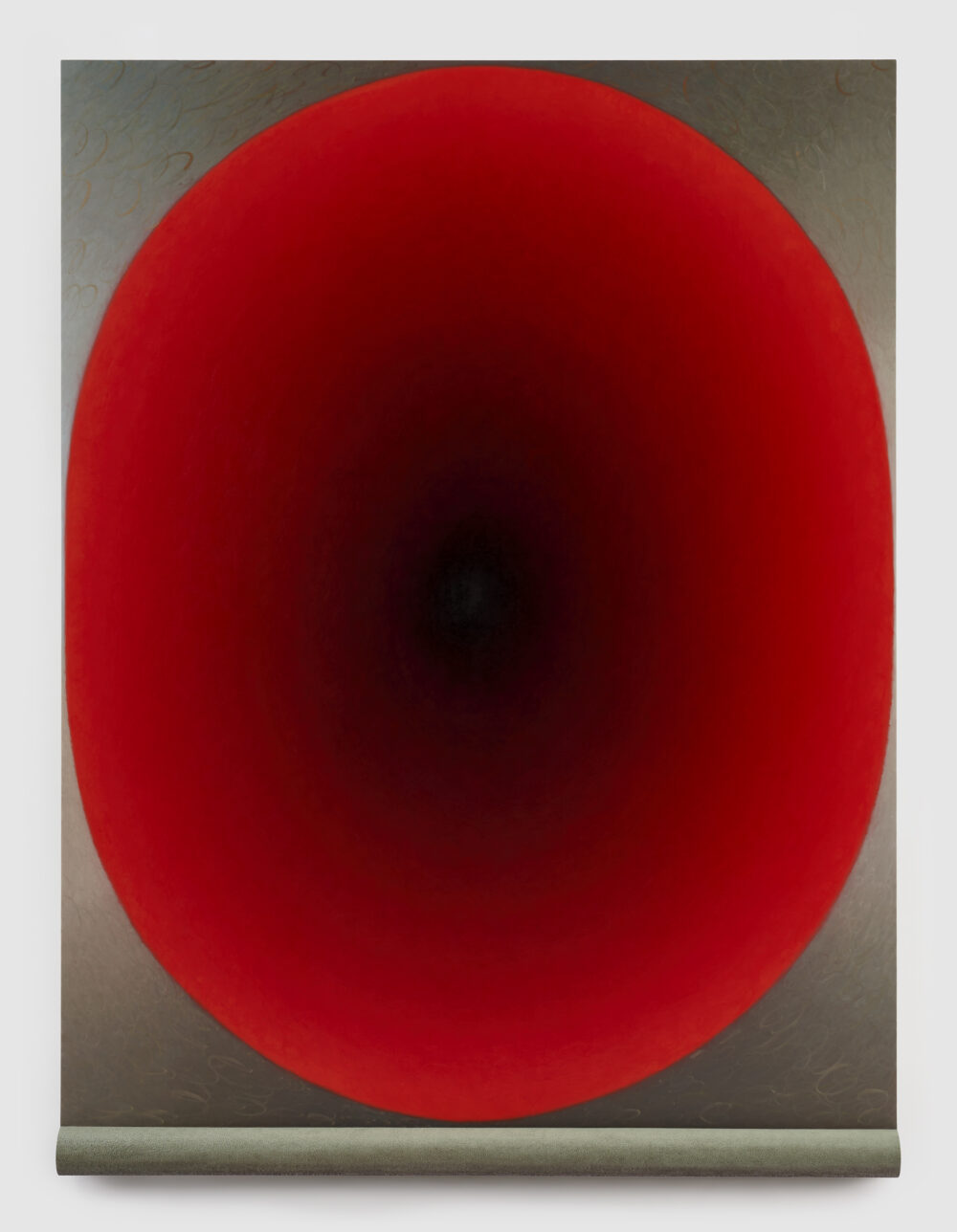 A red oval shape on a rectangular canvas