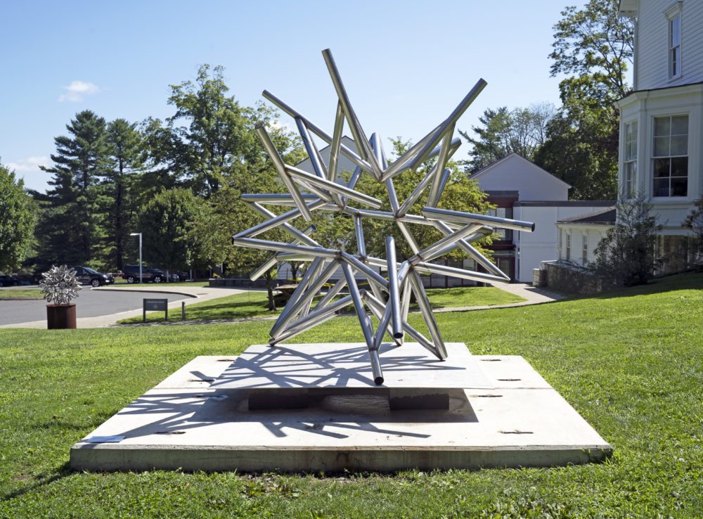 Stainless steel sculpture in form of abstract star by Frank Stella set in the lawn by Main Street in Ridgefield, CT in front of the Museum.