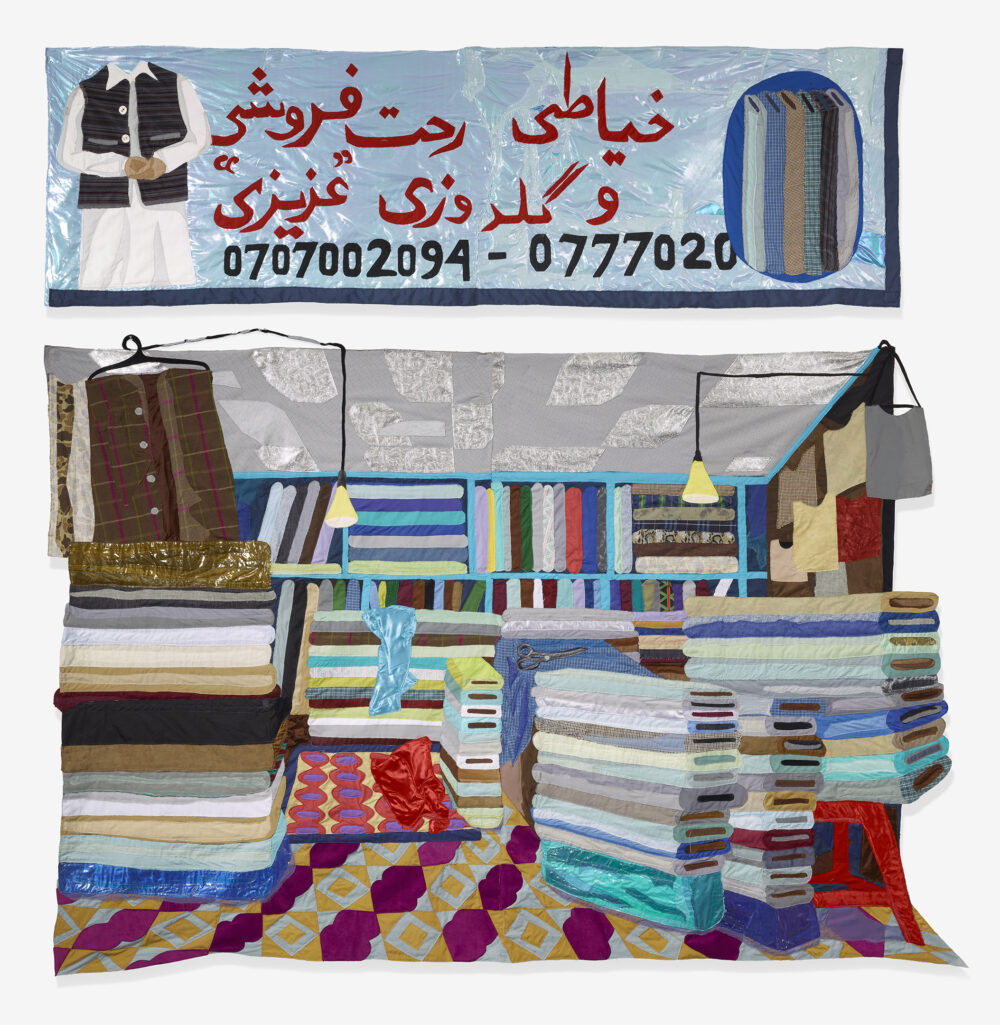 Textile work depicting the inside of a tailor shop with many colorful bolts of fabric.