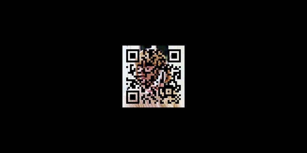 A white QR code over a square image of a blonde woman holding a telephone to her ear surrounded by a black background.