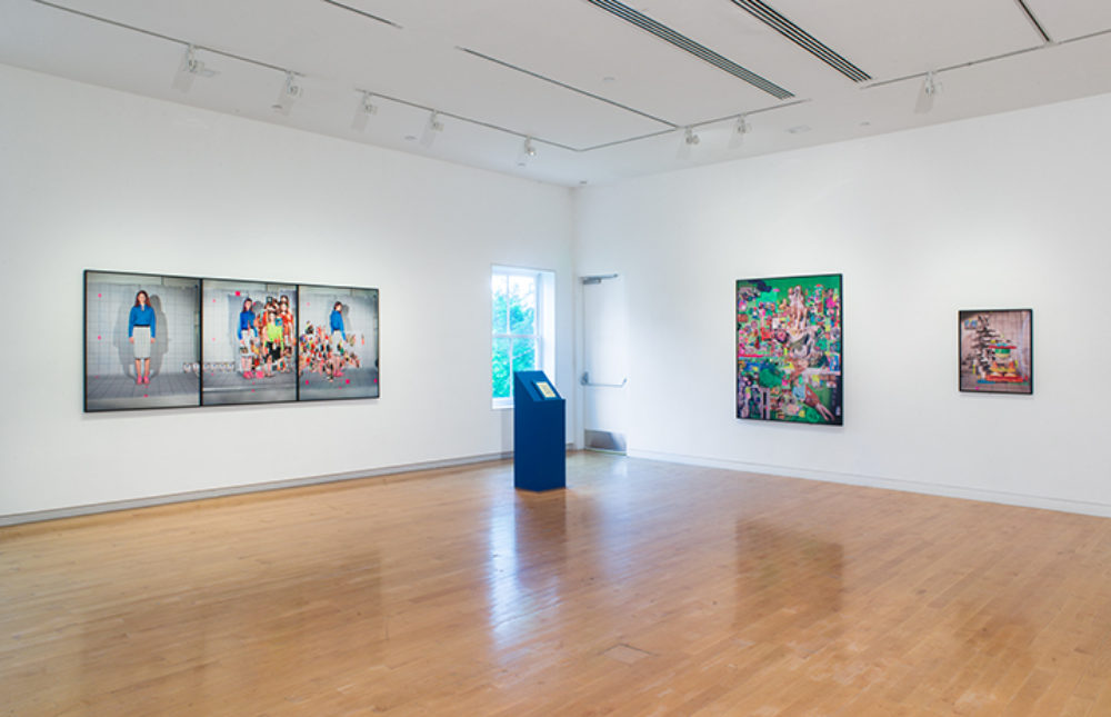 Three works installed on gallery walls