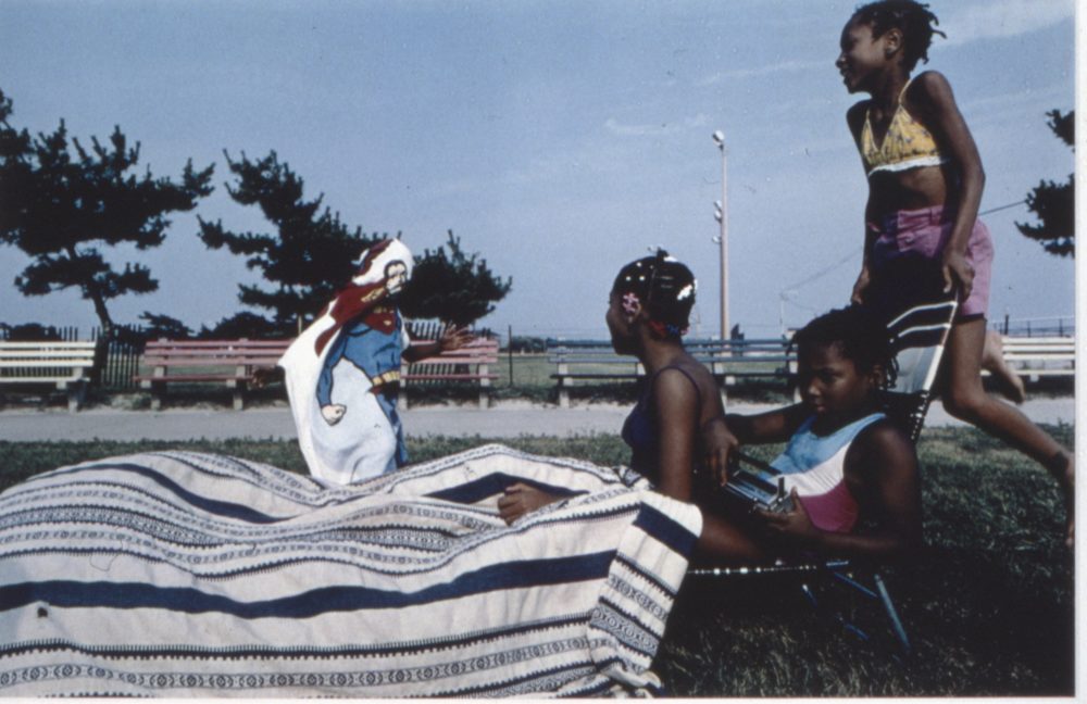 A photograph of children playing in Jacob Riis Park located in Queens, NY