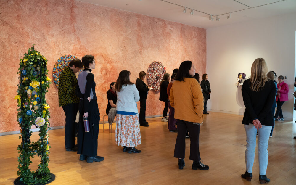 people on a group tour in an art gallery