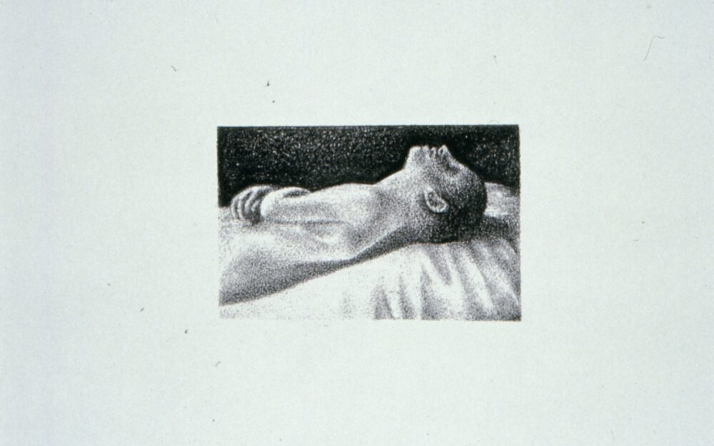 pencil drawing of a man from the neck up lying down