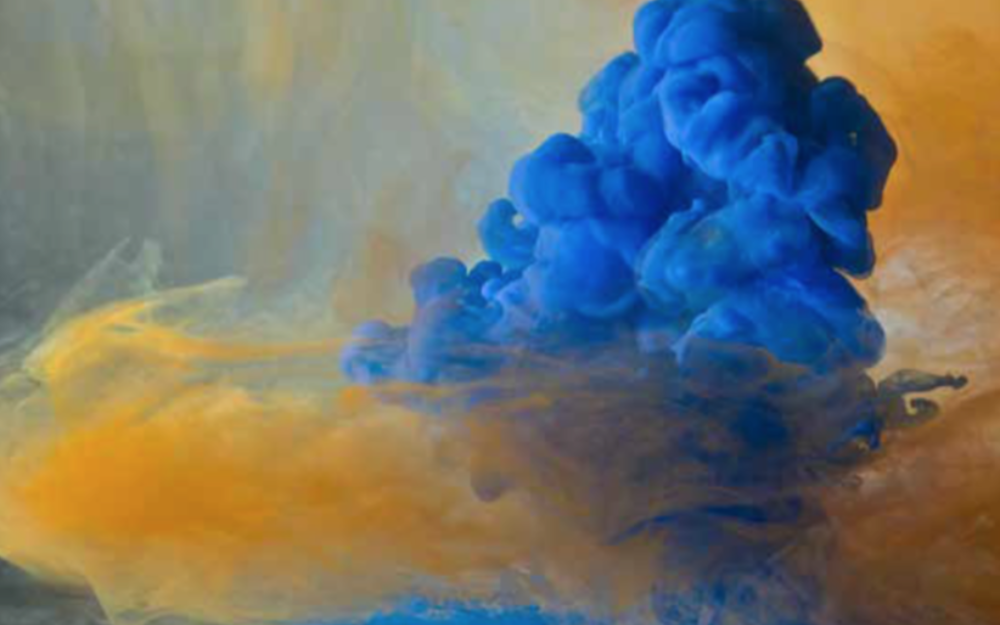 Blue cloud of paint against yellow background