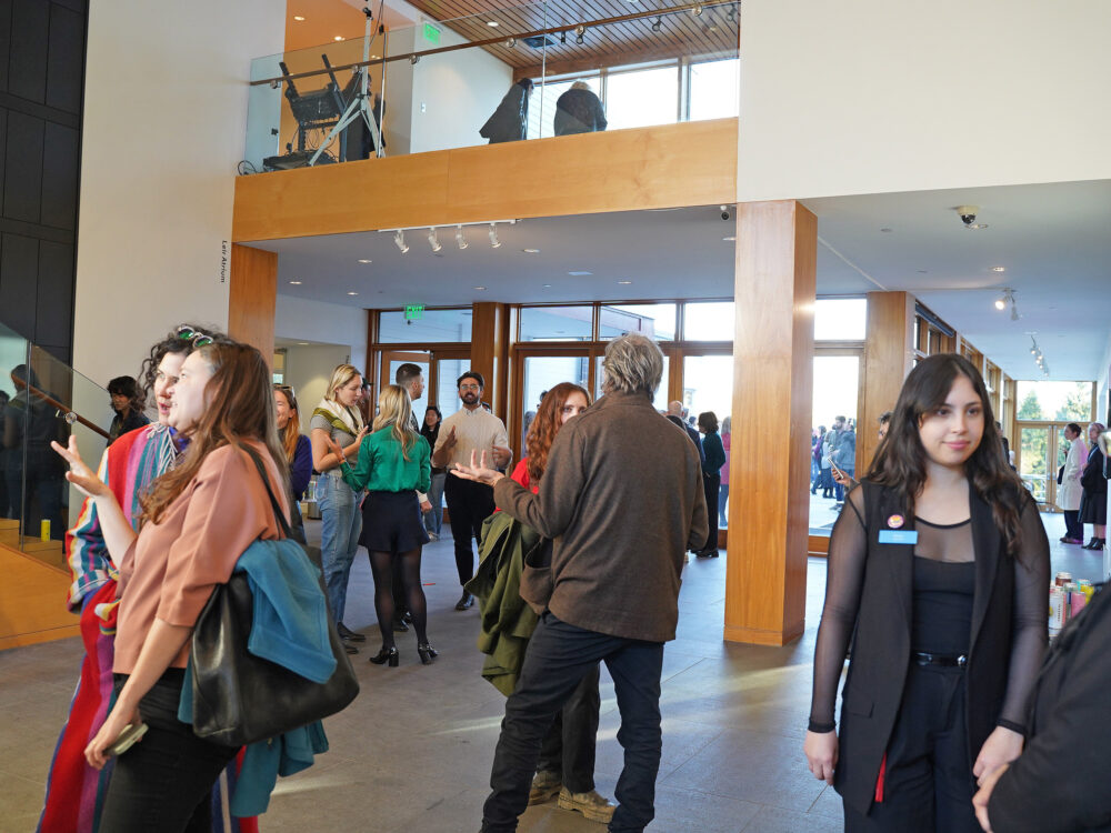 visitors at the lobby of a museum