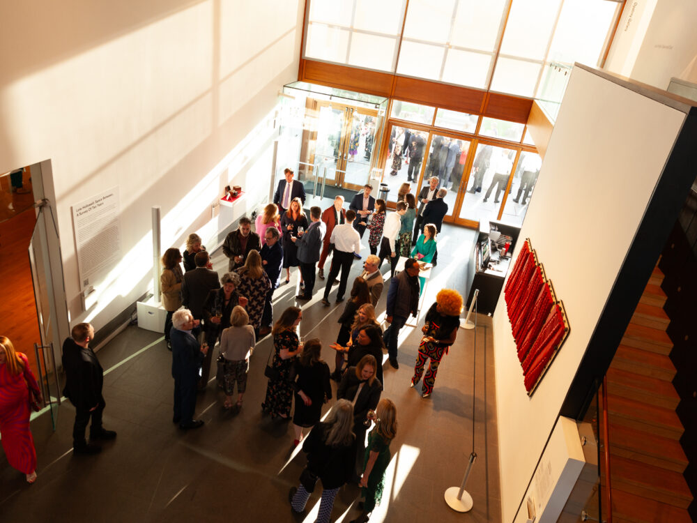 Aerial photograph of guests in the Museum's atrium.