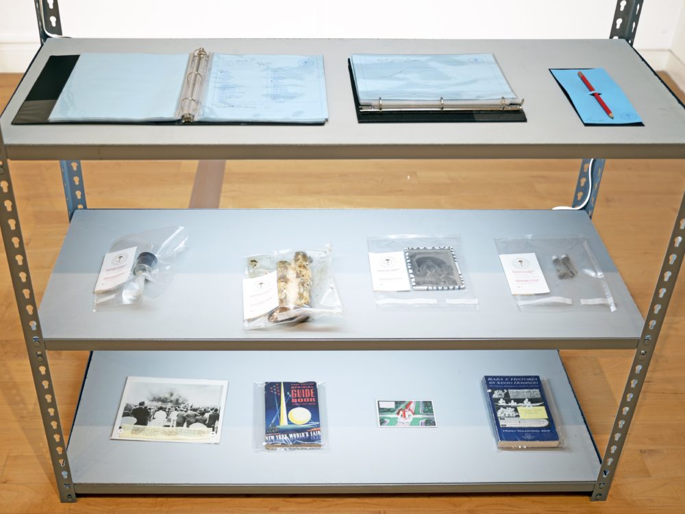 Forensic shelves with evidence samples on each.