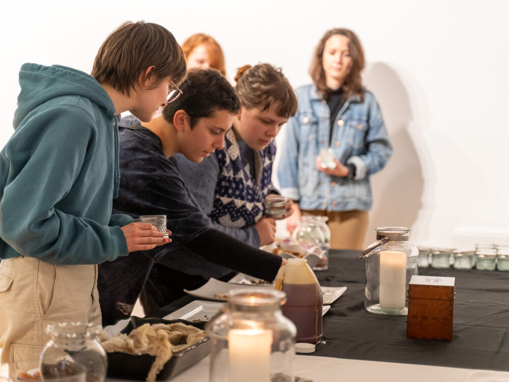 Workshop participants filling their spell jars