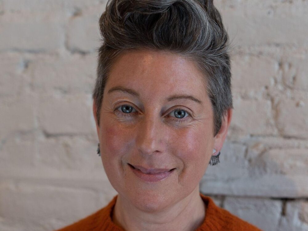 A headshot of Buddhist ion, Kristen Davis