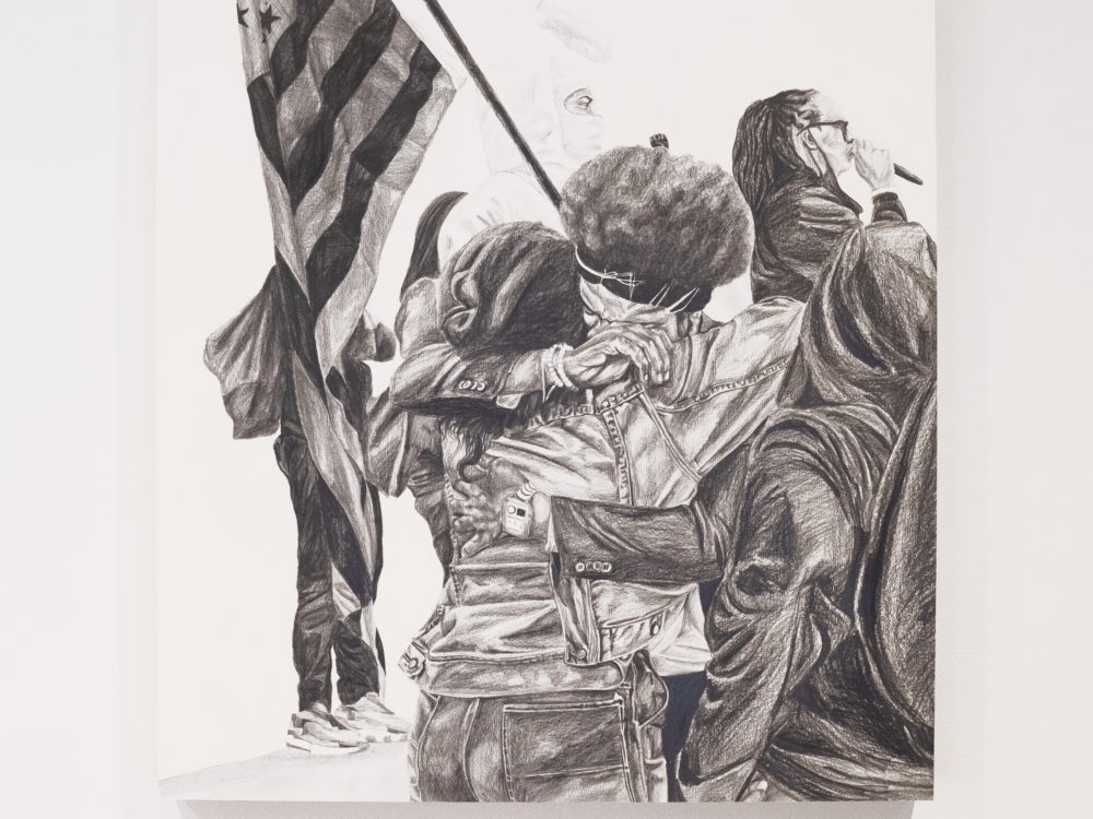 Drawing of people hugging in the foreground with a person holding an American flag in the background.