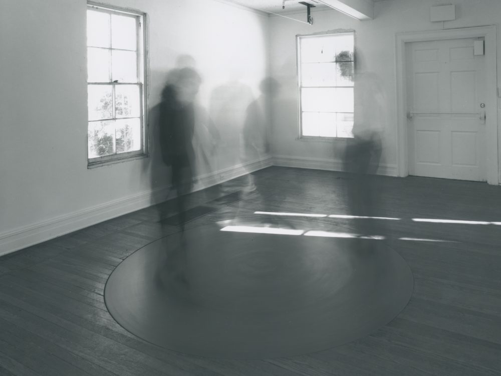 This is an image of Ann Hamilton's installation whitecloth which features a rotating floor