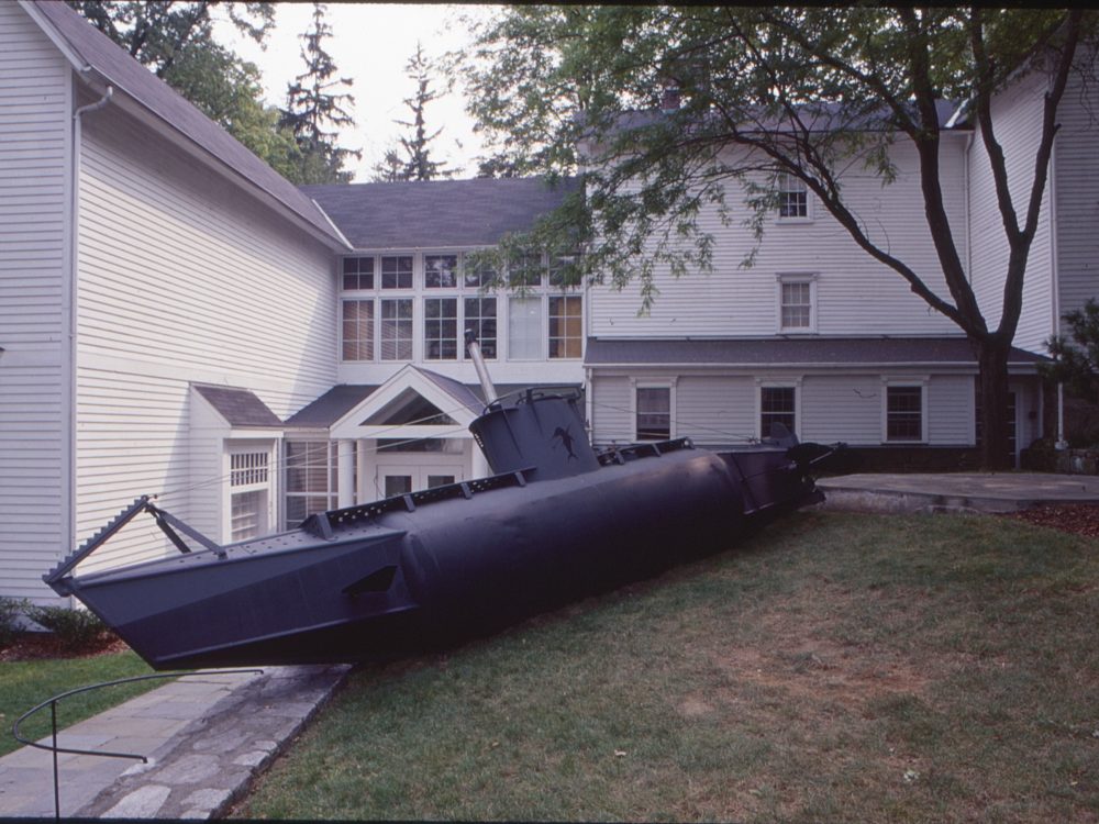 This is a photograph of a large installation of a submarine which sat outside the museum during the exhibition
