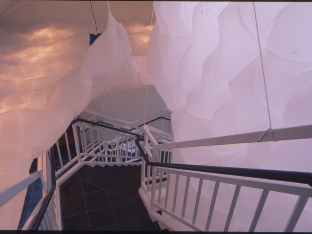 This is a photograph from an installation which encompassed the stairwell which made it look and feel like you were ascending into the clouds